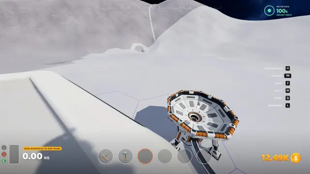 Octagonal capsule-catching dish on support legs with a conveyor belt leading out from underneath it