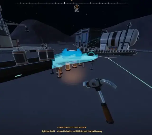 Newly built Splitter on a conveyor carrying dust capsules, with the prompt to draw its belts